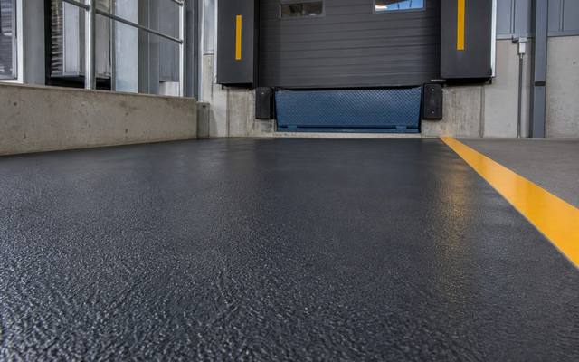 Textured non-slip coating at a loading dock door in Lethbridge