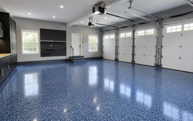 Blue flake epoxy floor in a double garage in Lethbridge